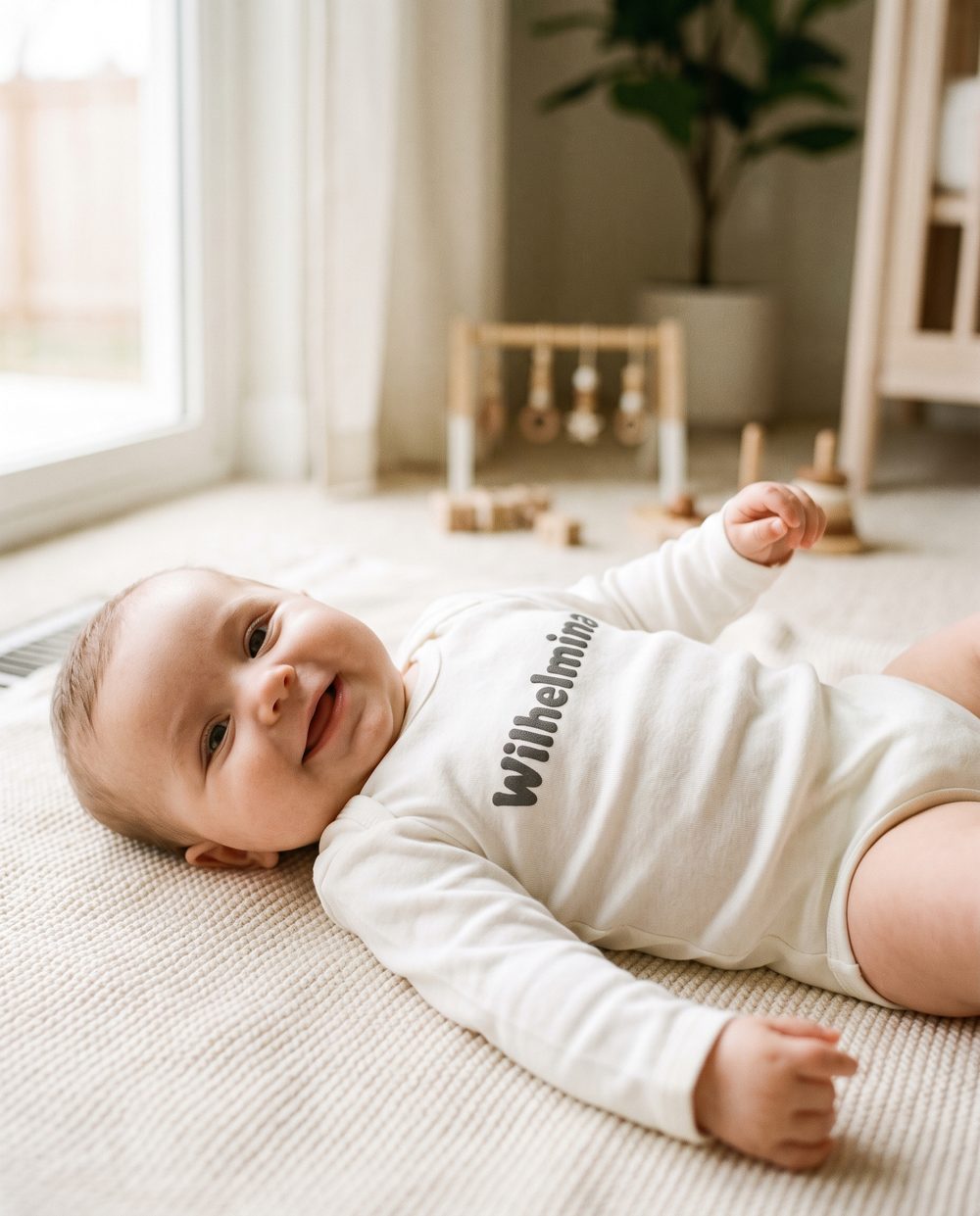 “Wilhelmina” on a White bodysuit